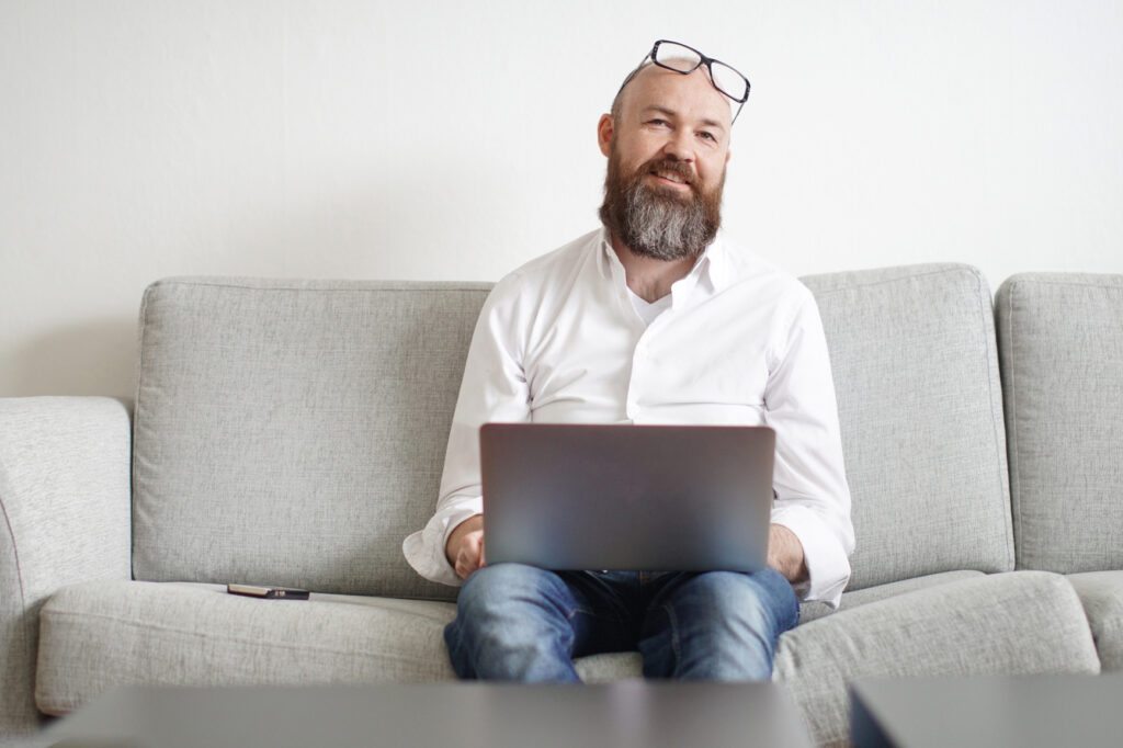 Businessman Working From Home Doing Business - Happy Businessman Running Business